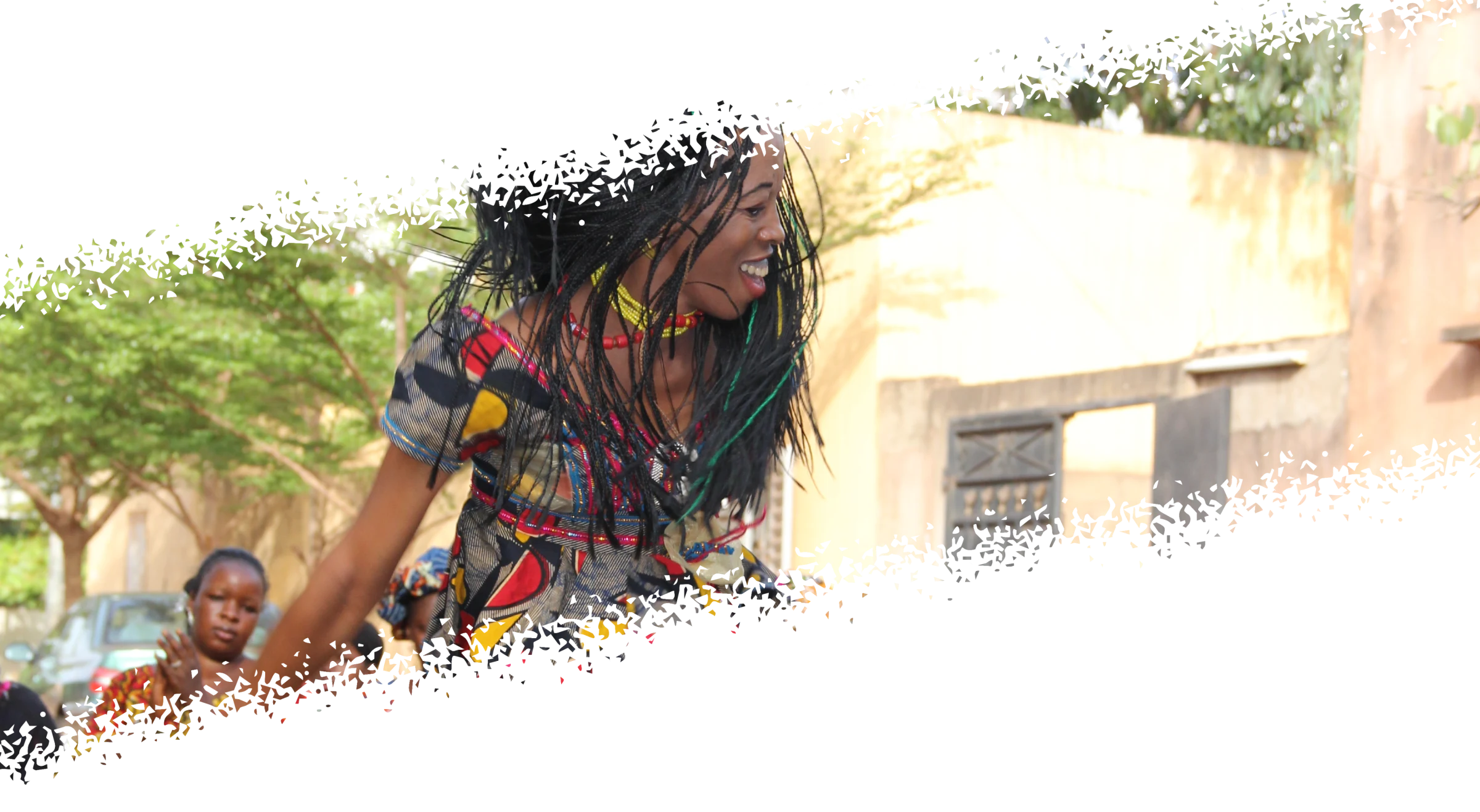 A dancer sharing embodied cultural knowledge outdoors